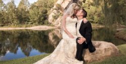 Groom kissing bride.