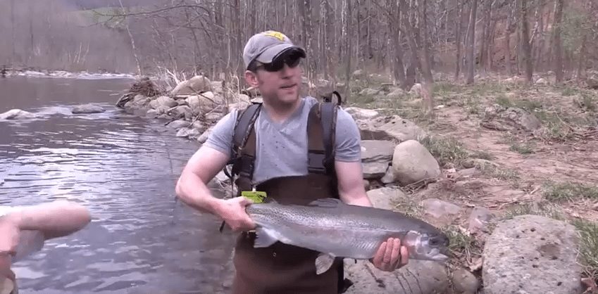 man holding large fish